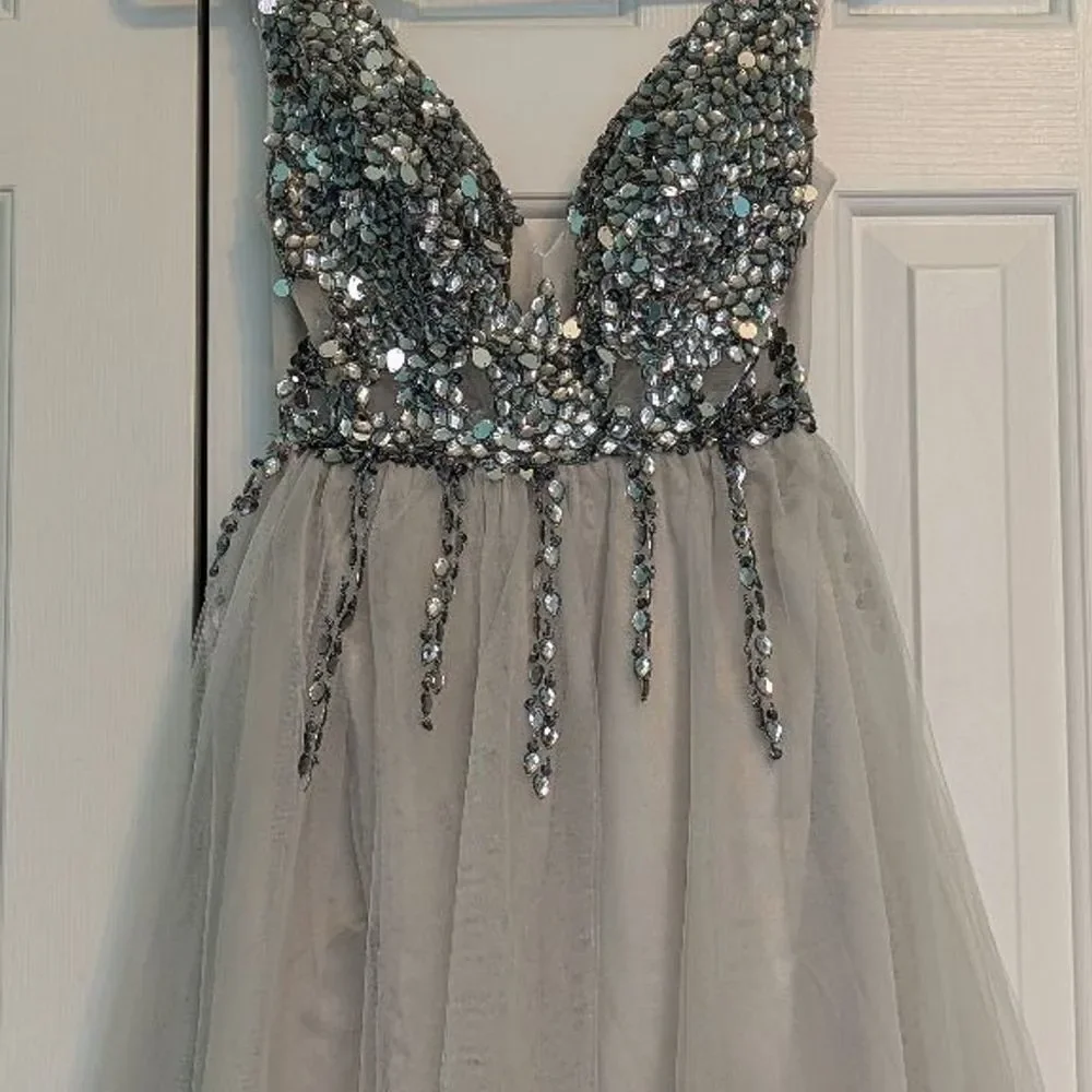 Elegant Purple Evening Gown With Blue Rhinestone Details